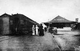 The province of Almonte - two women walking the boardwalks of a trainstation.